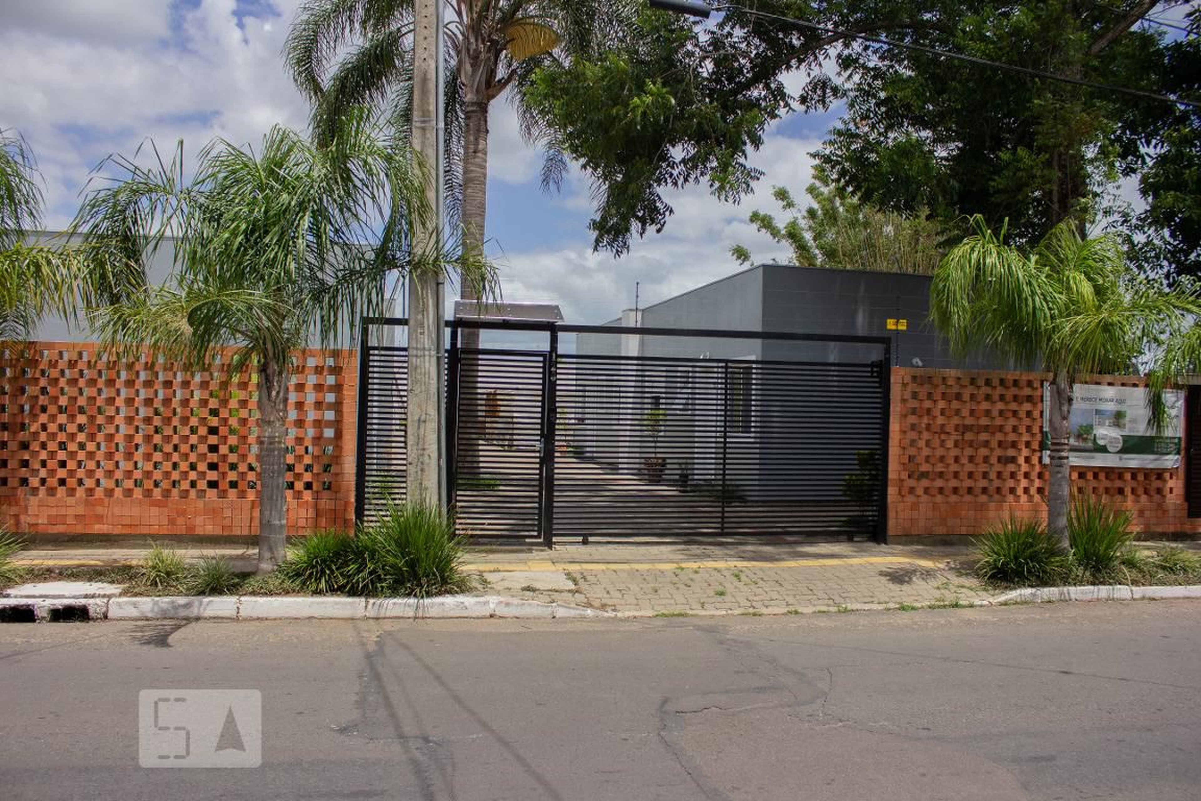 Fachada do Condomínio Condomínio Morada dos Coqueiros