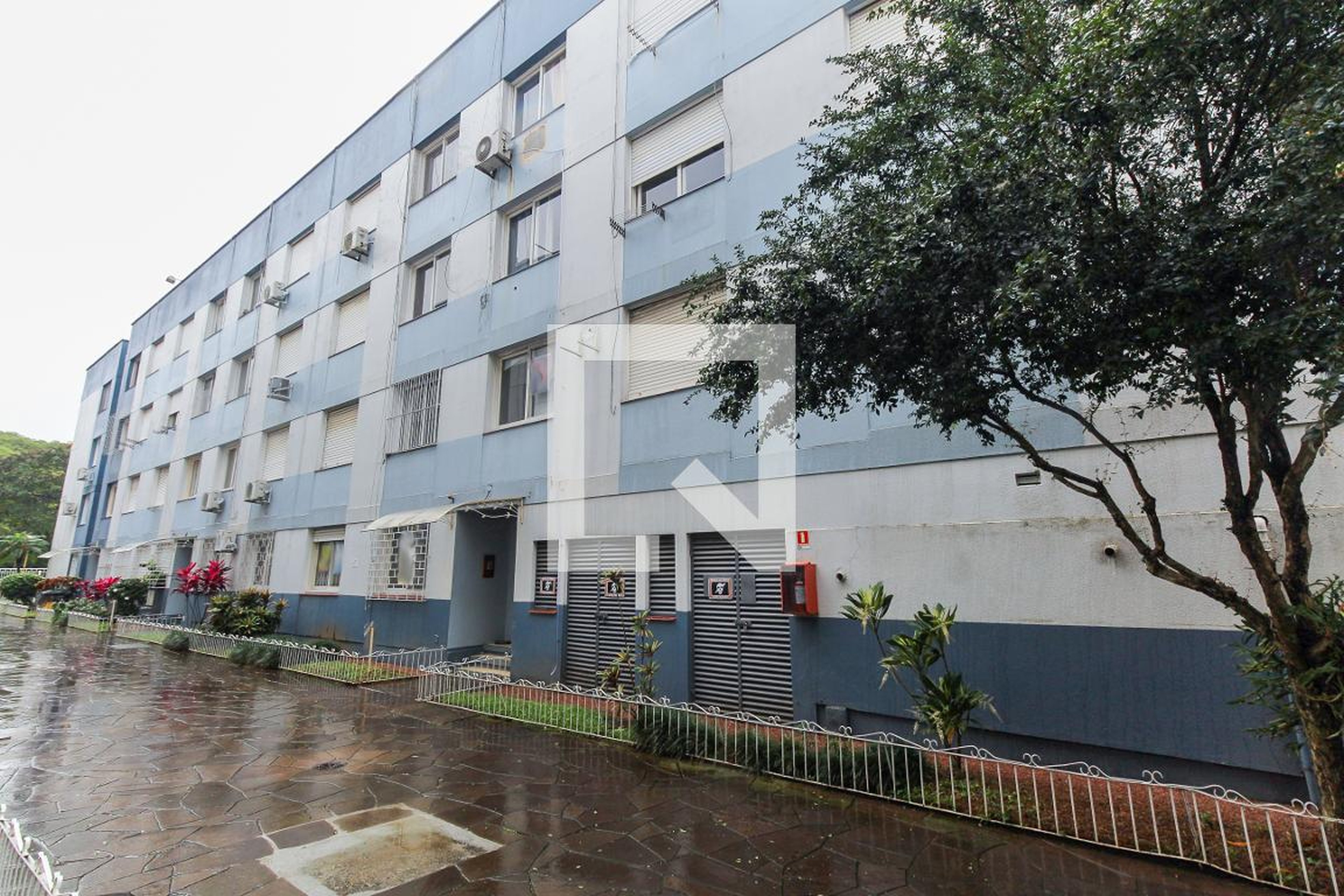 Fachada Condomínio em Rua Cipó, 312