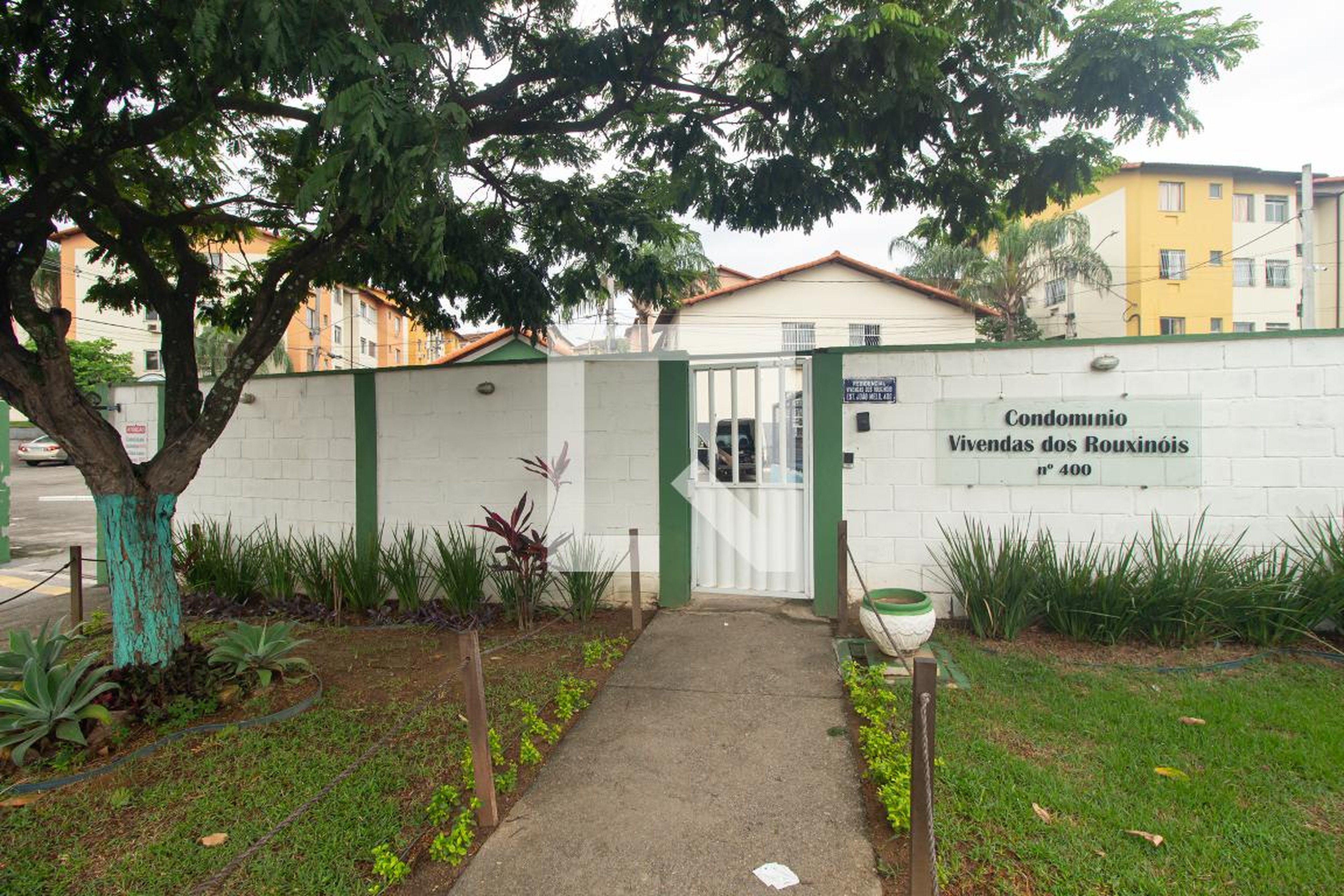 Fachada do condomínio Condomínio Vivendas dos Rouxinóis