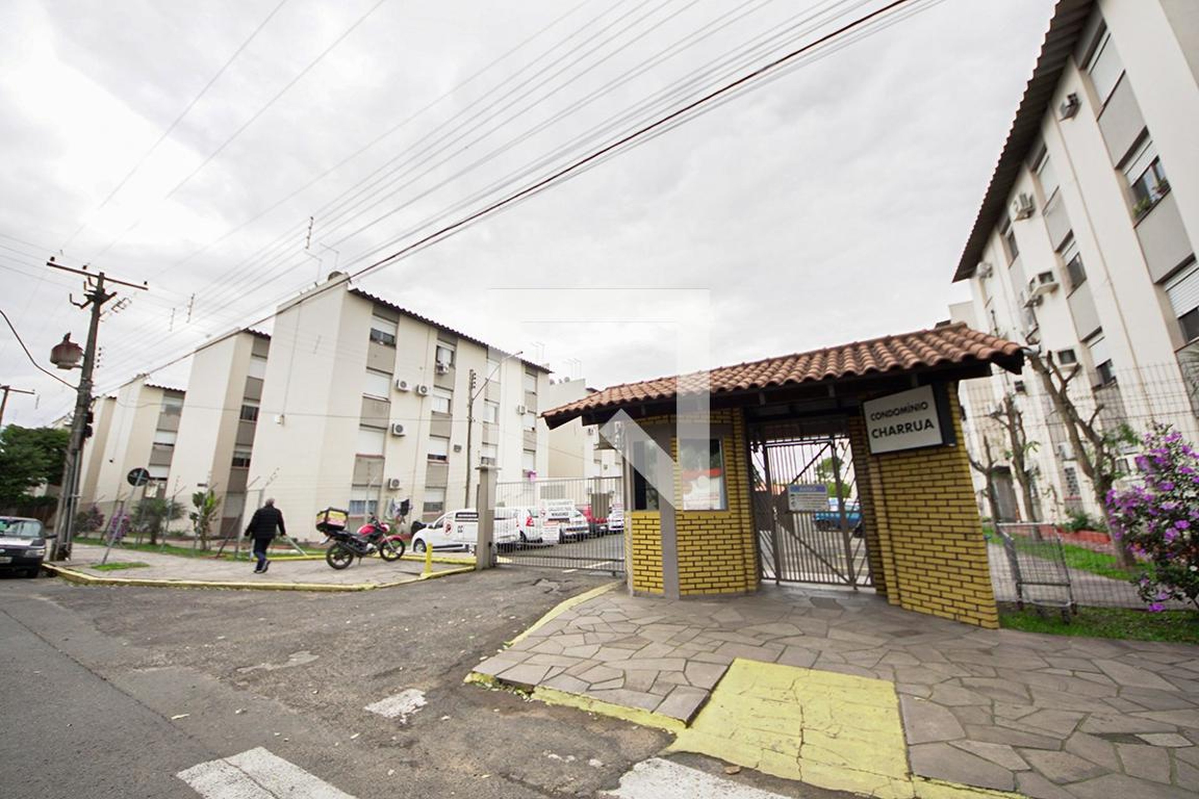 Fachada do Condomínio Condomínio Charrua