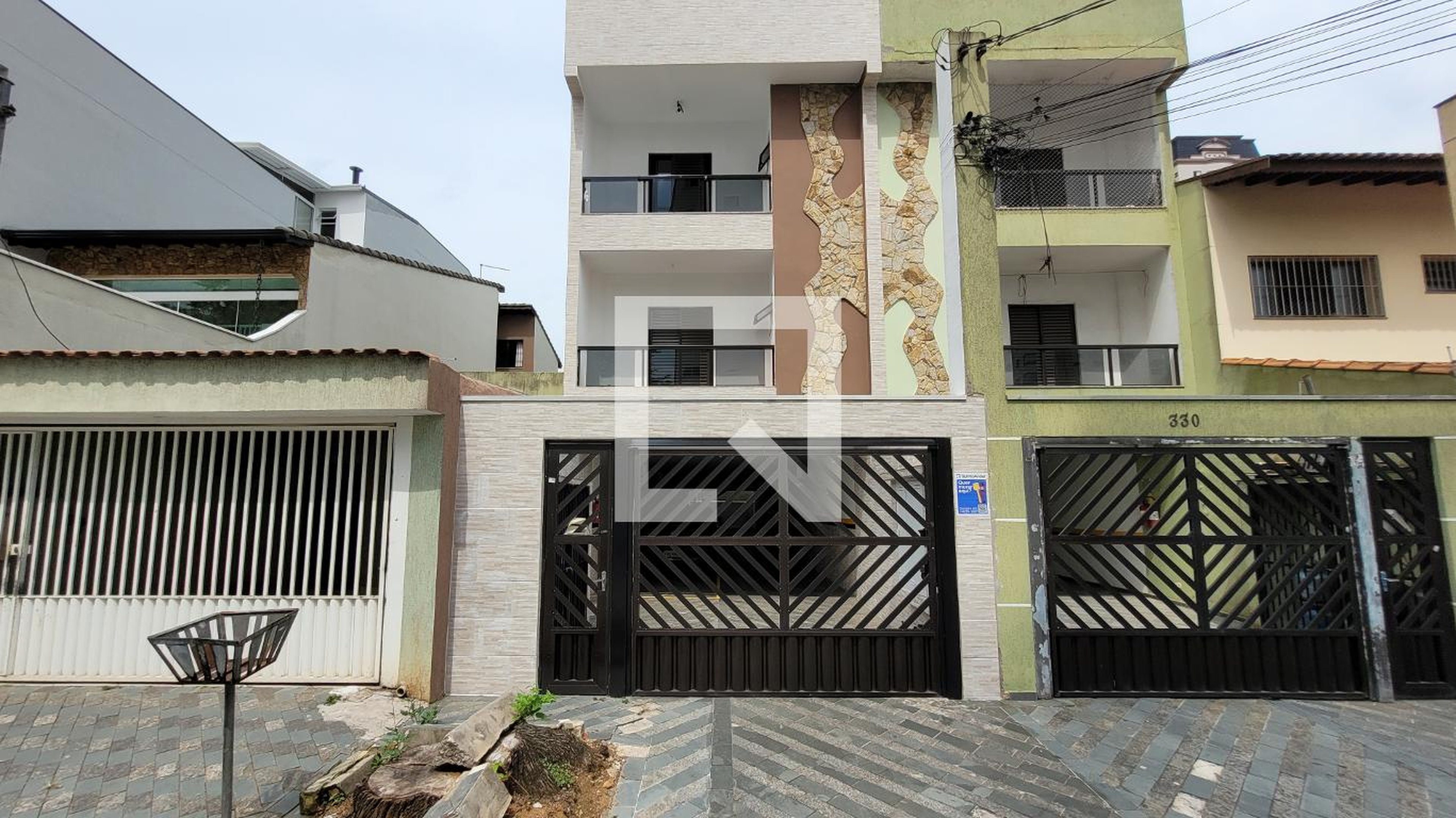 Fachada Condomínio em Rua Cotoxó, 334