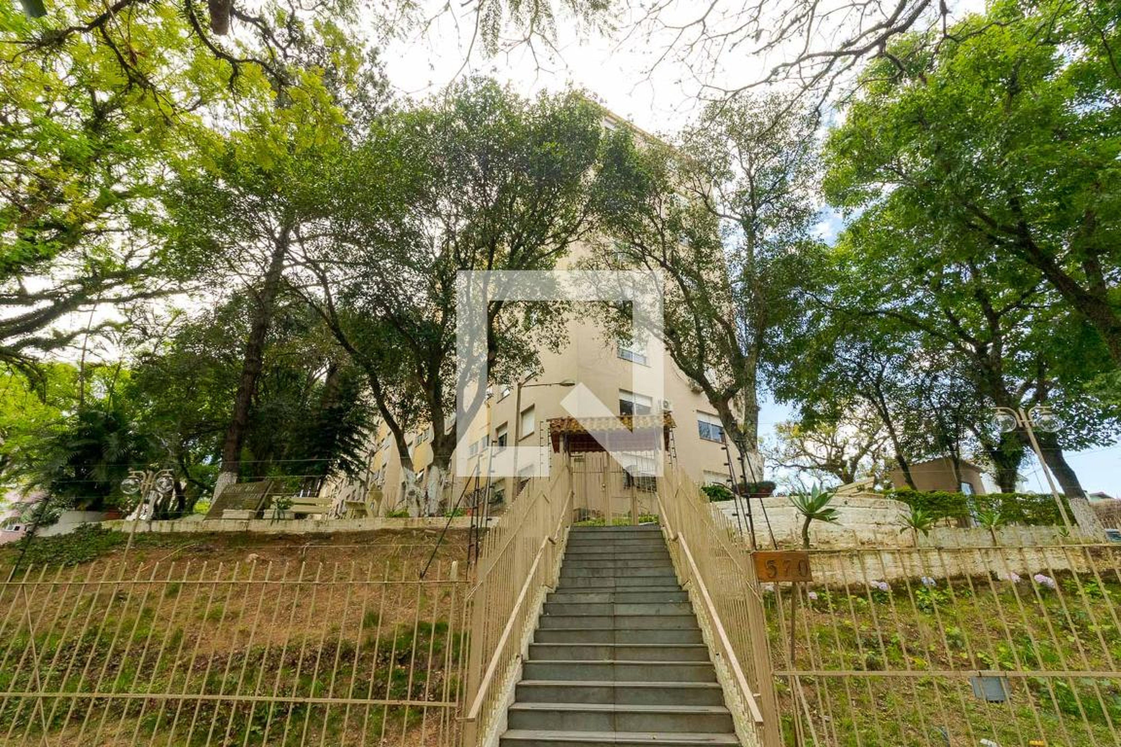 Fachada do condomínio Condomínio Jardim das Palmeniras