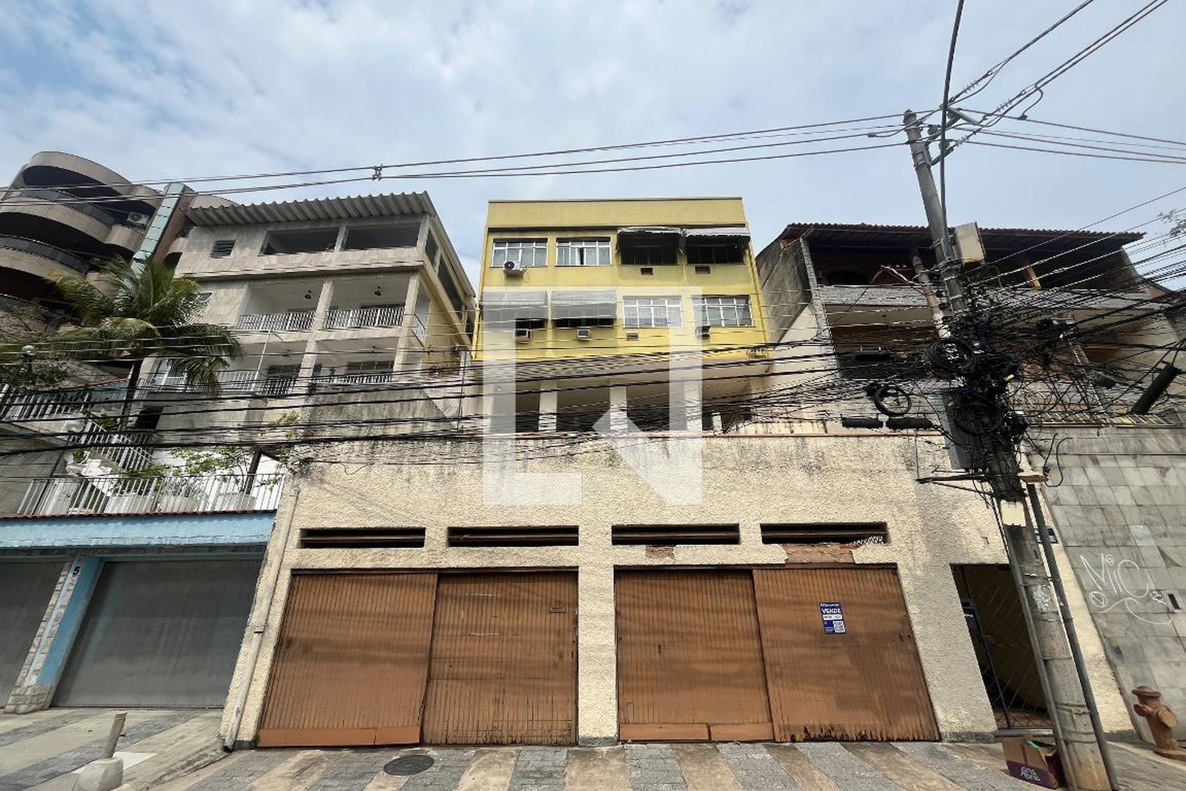 Fachada Condomínio em Rua Nogueira Acioli, 7