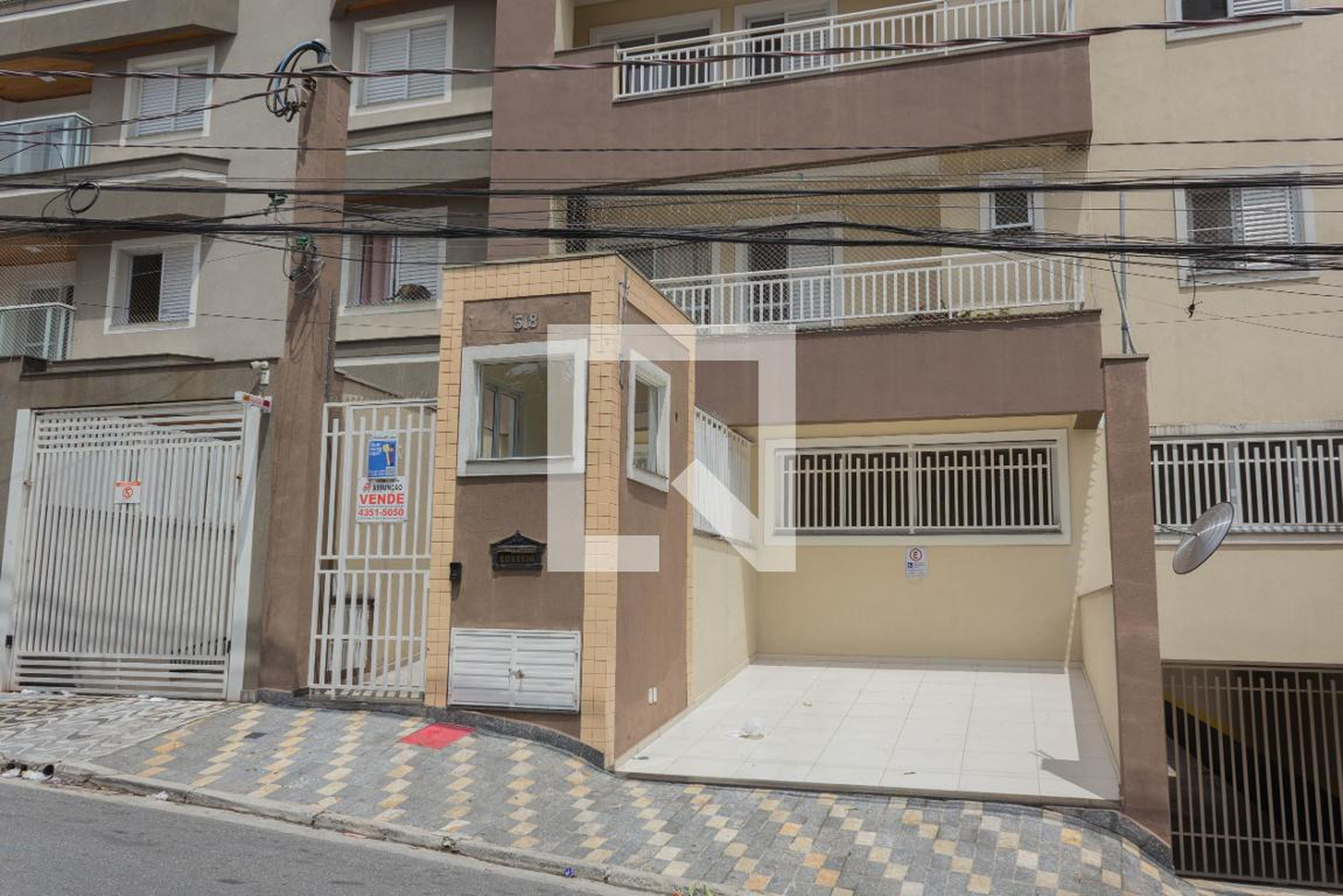 Fachada Condomínio em Rua Brasílio Machado, 518