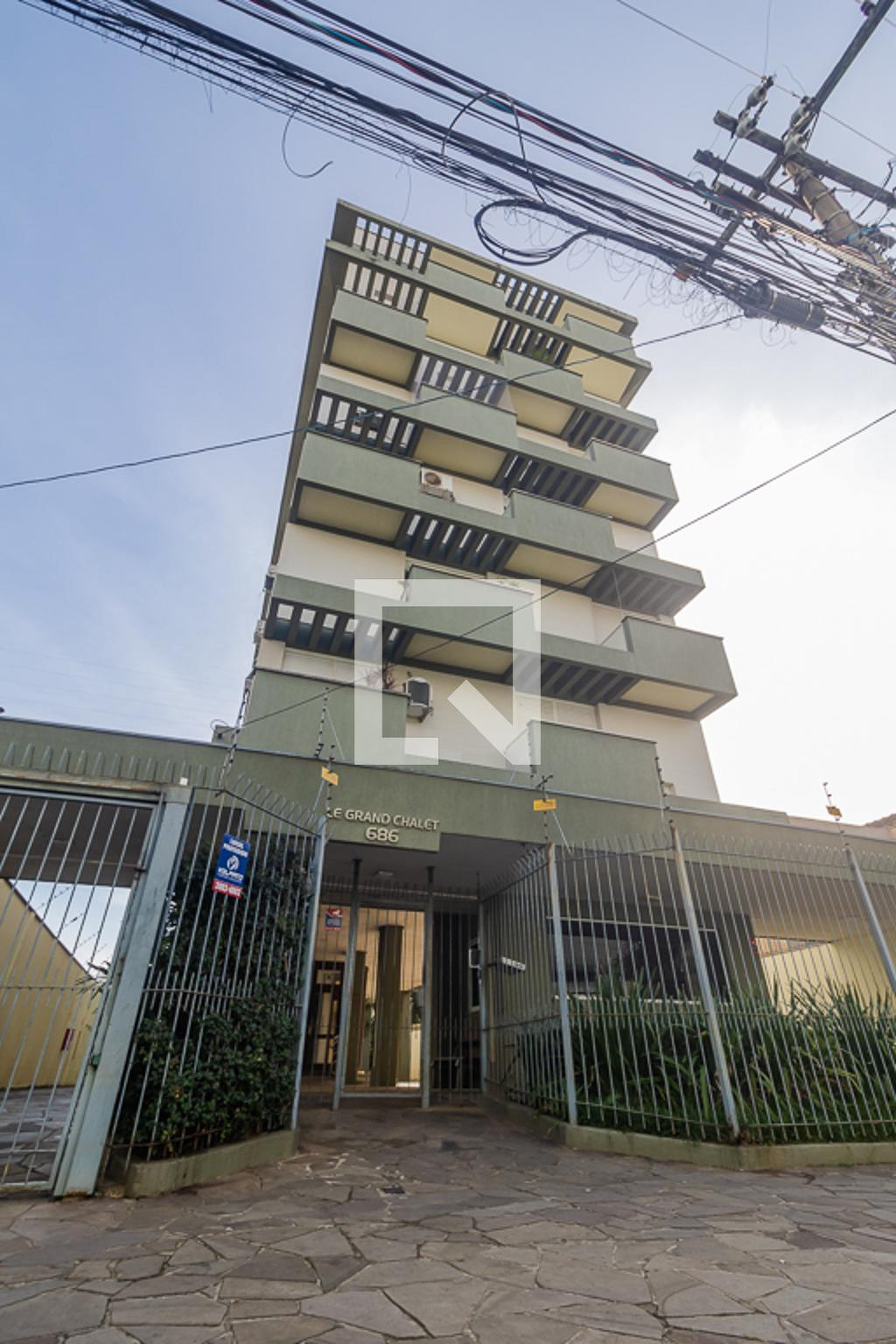 Fachada Condomínio Lê Grand Chalet