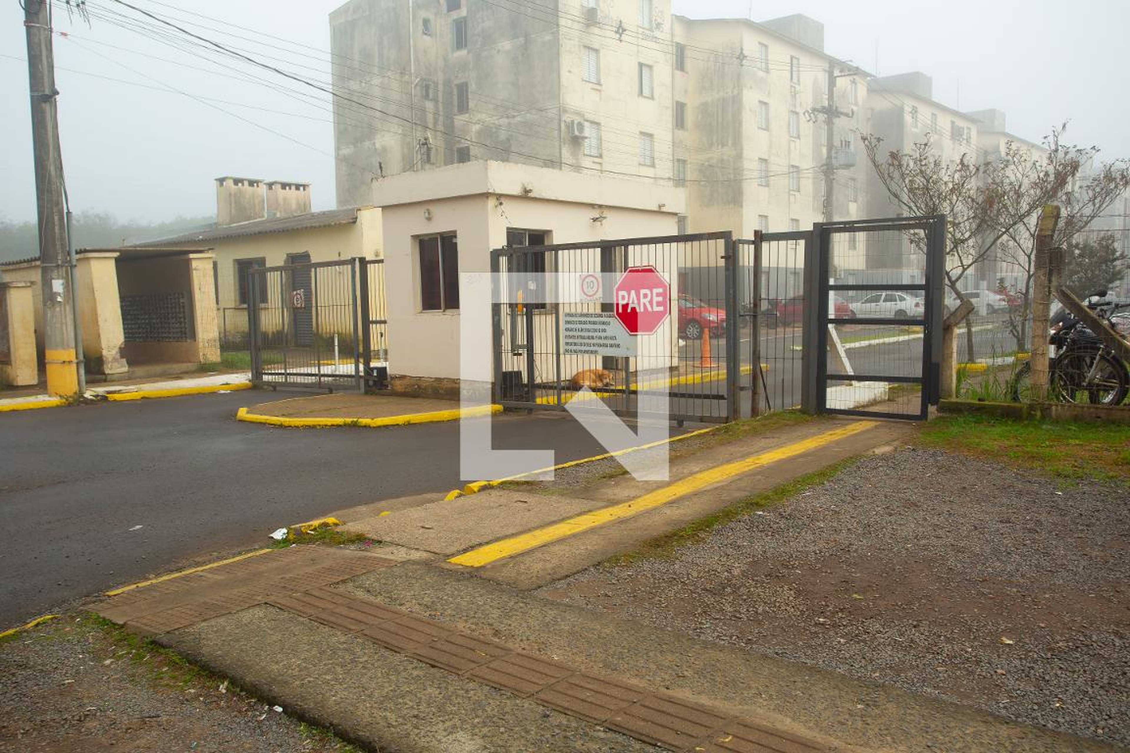 Fachada do Condomínio Condomínio Arlindo