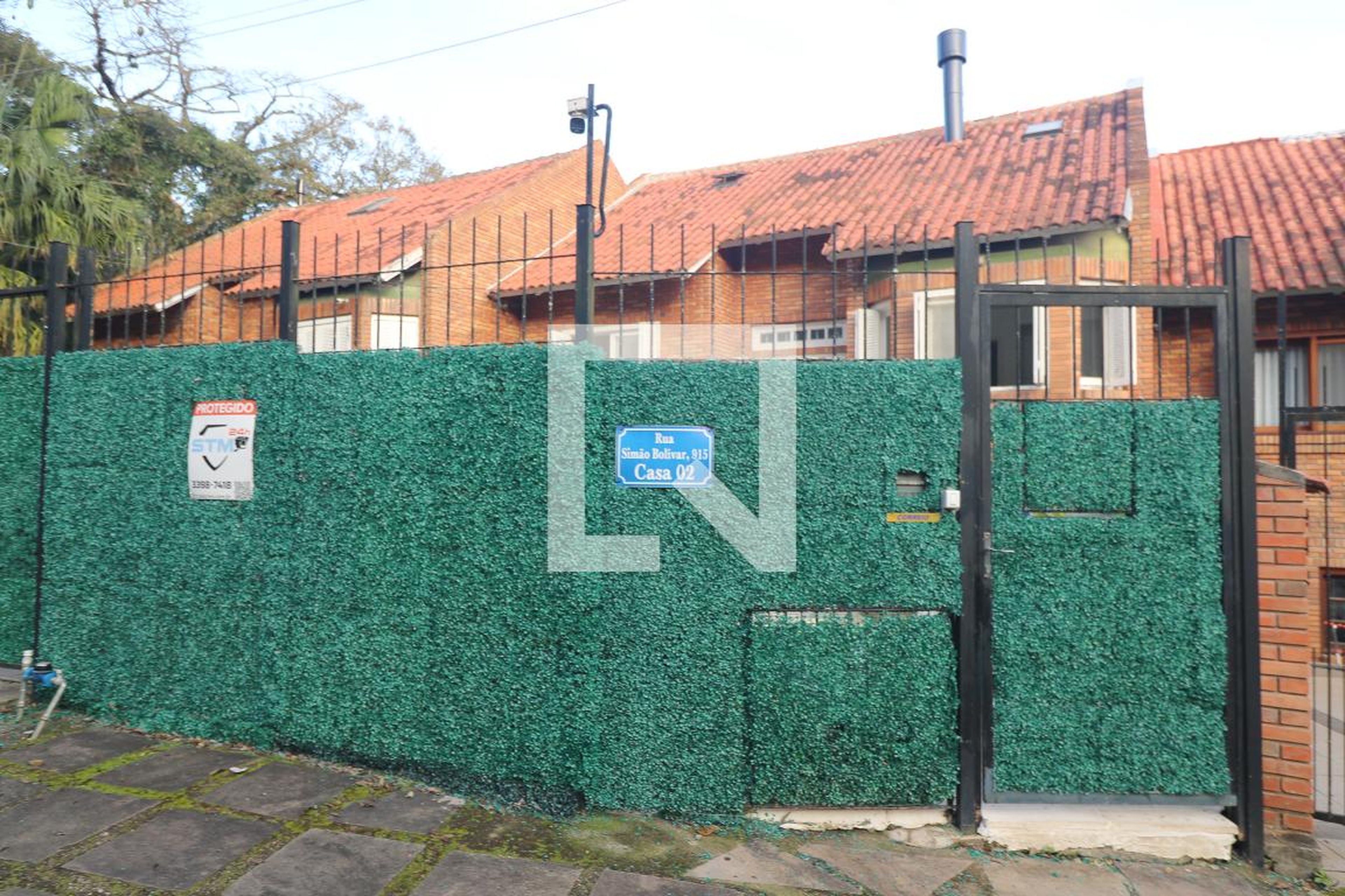 Fachada Condomínio em Rua Simão Bolivar, 915