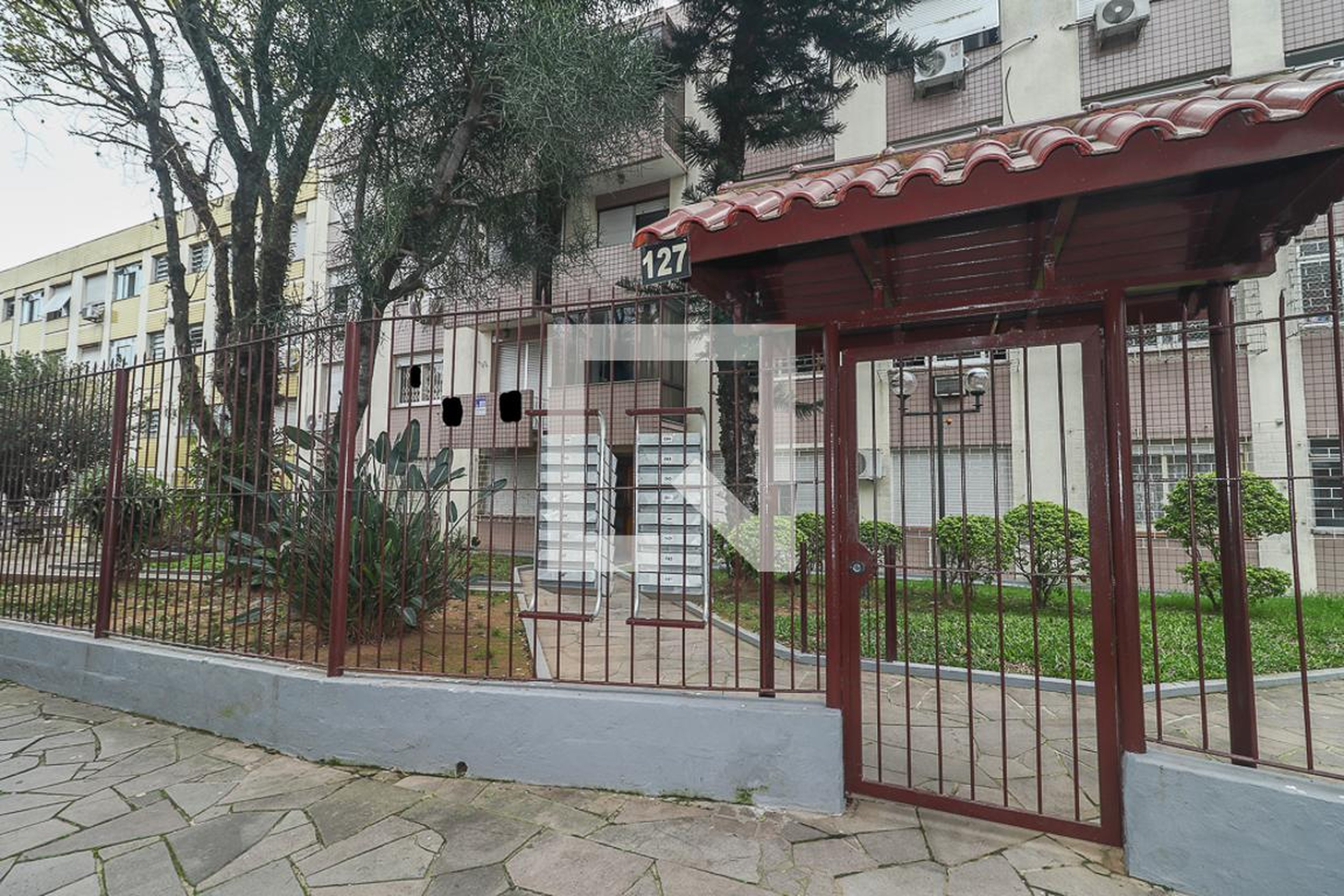 Fachada Condomínio em Rua Domingos Seguézio, 127