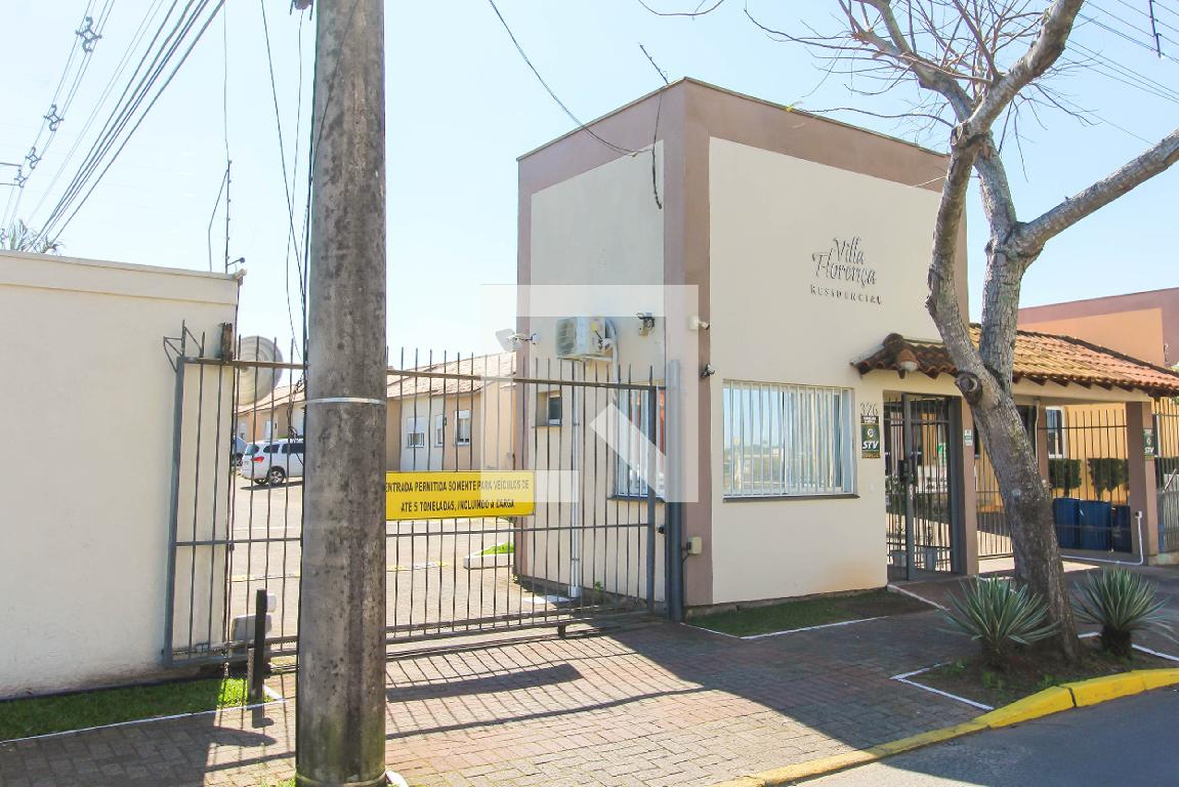 Fachada do Condomínio Condomínio Villa Florença