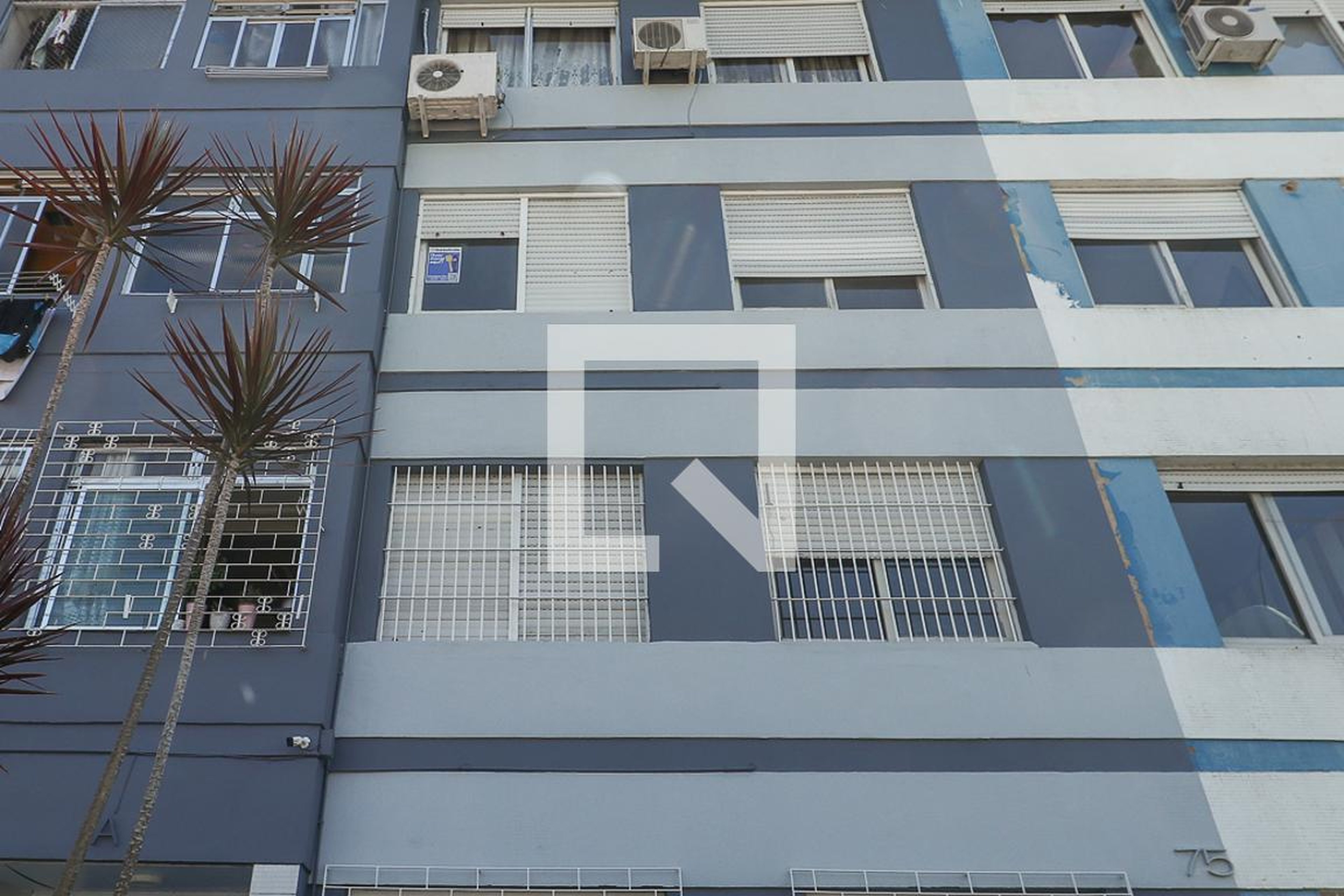 Fachada Condomínio em Rua Orlando Aita, 75