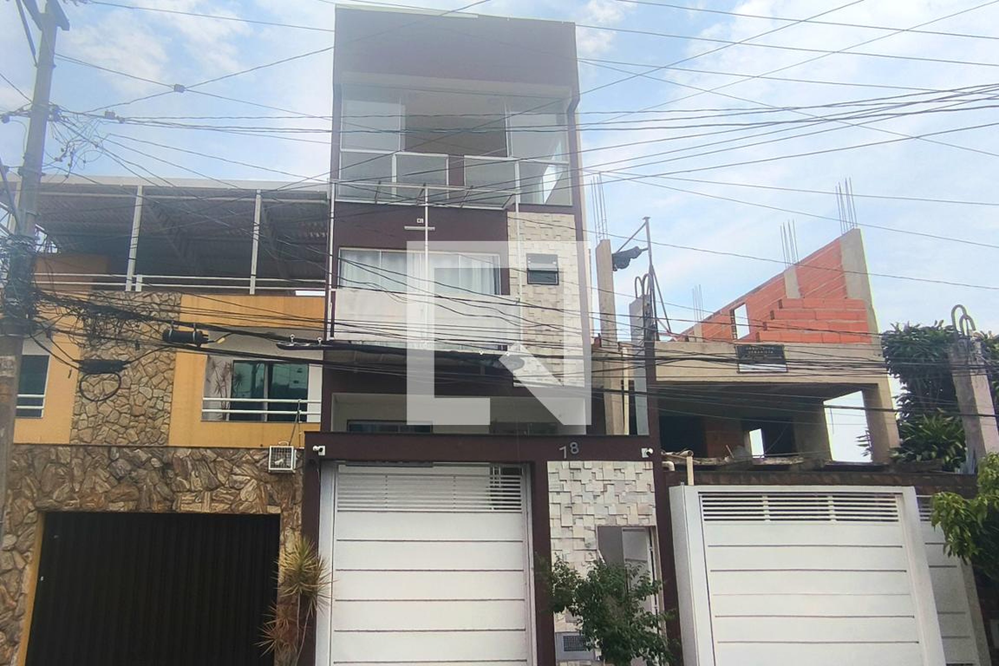 Fachada Condomínio em Rua Tupi, 78