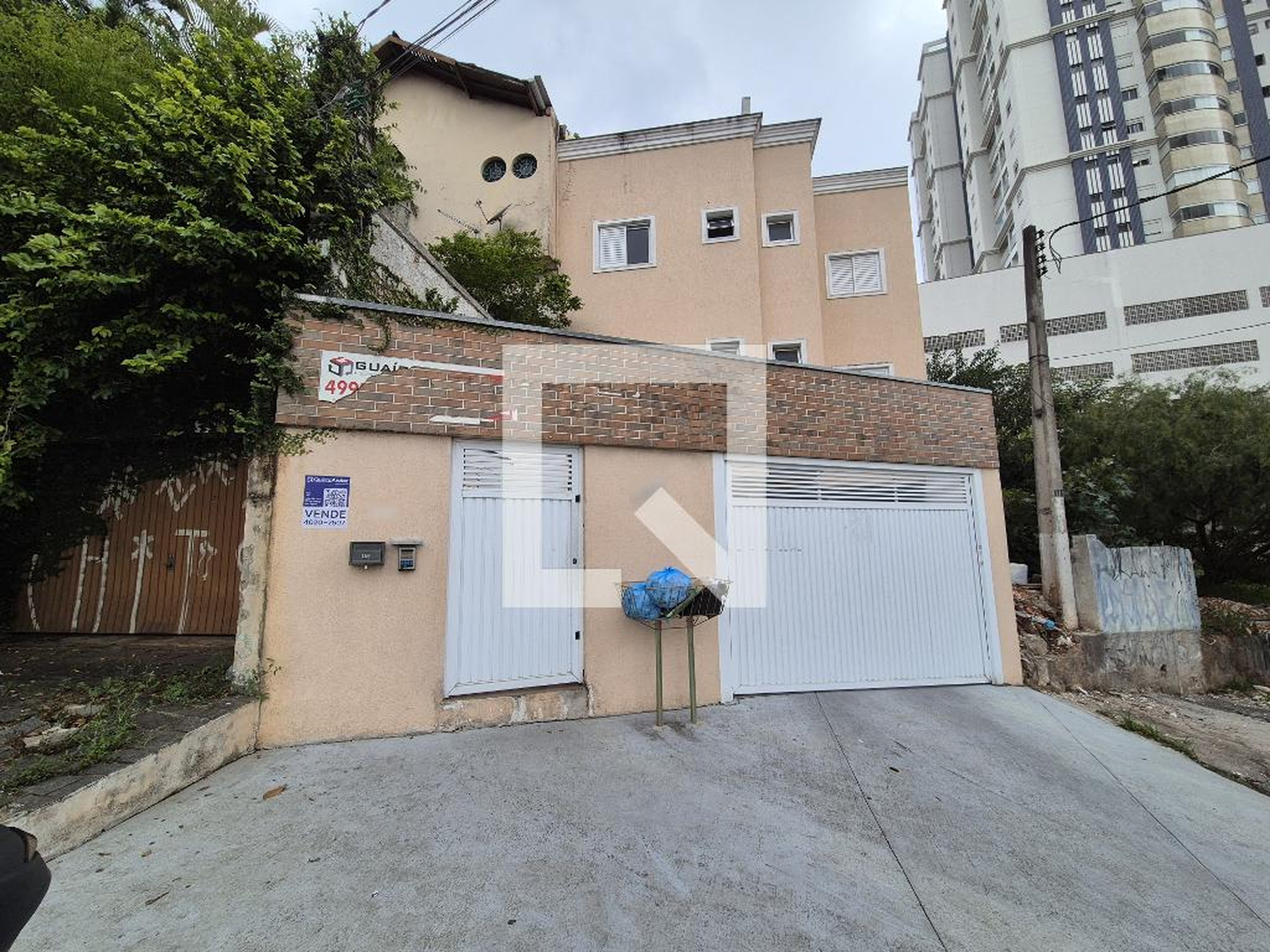 Fachada Condomínio em Rua Andarai, 165