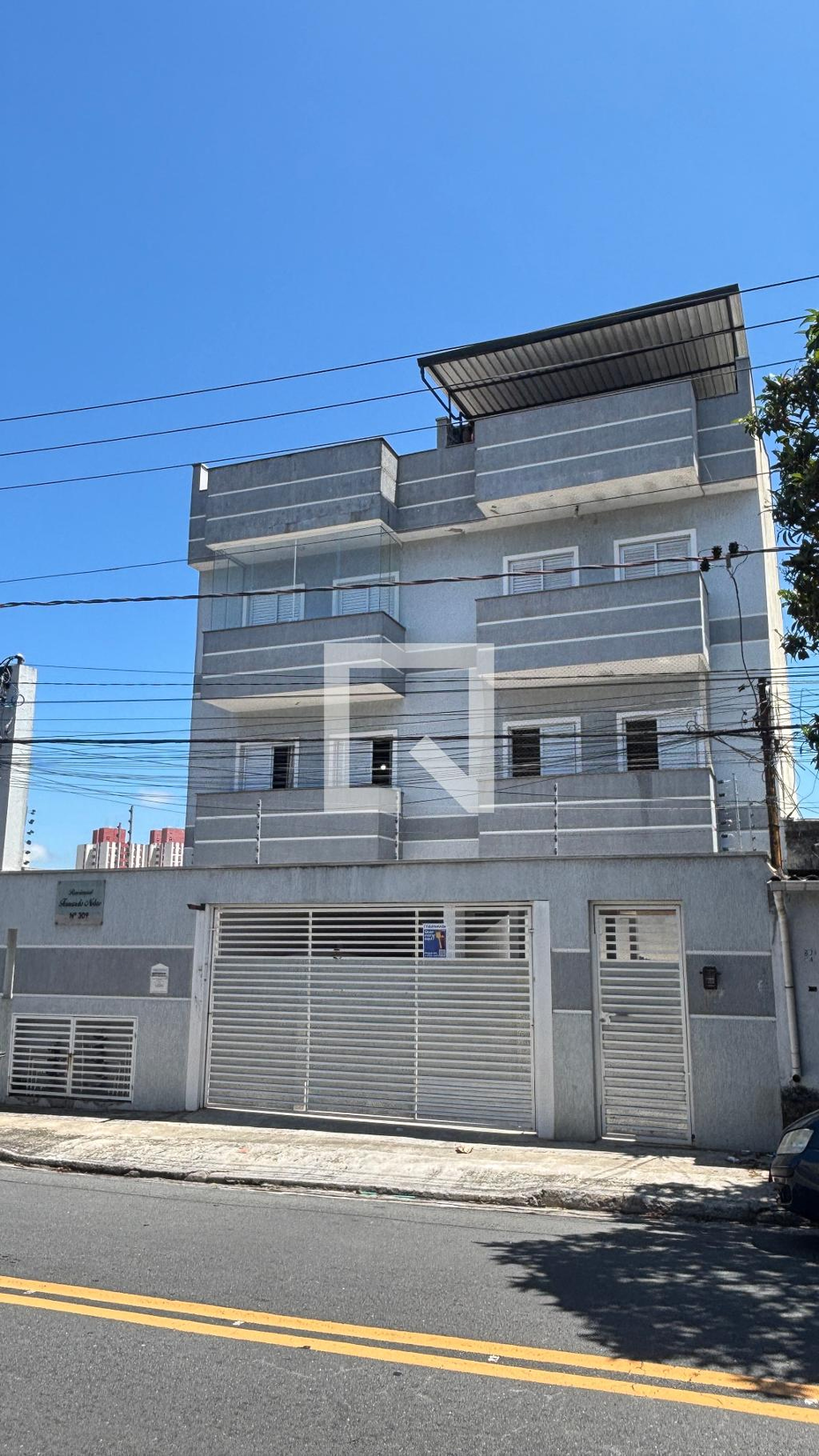 Fachada Condomínio em Rua Brasílio Rodrigues, 309