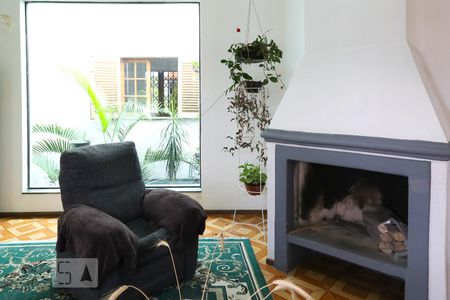 Casa à venda com 323m², 6 quartos e 3 vagas Casa à venda com 323m², 6 quartos e 3 vagasSala de estar