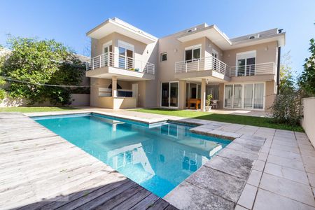 Casa de condomínio à venda com 460m², 4 quartos e 5 vagasFachada Externa