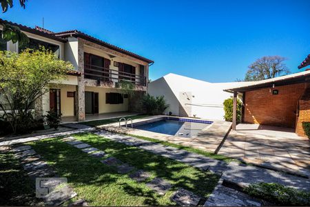 Casa de condomínio à venda com 480m², 5 quartos e 2 vagas Casa de condomínio à venda com 480m², 5 quartos e 2 vagasFachada - Piscina - Churrasqueira