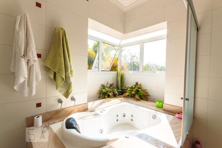 Casa de condomínio à venda com 400m², 4 quartos e 3 vagasBanheiro do Quarto 1