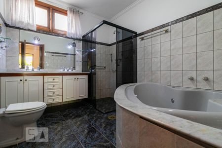 Casa de condomínio à venda com 600m², 4 quartos e 6 vagas Casa de condomínio à venda com 600m², 4 quartos e 6 vagasBanheiro da Suíte 1