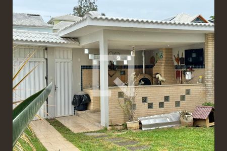 Casa de condomínio à venda com 296m², 4 quartos e 3 vagas Casa de condomínio à venda com 296m², 4 quartos e 3 vagasÁrea externa