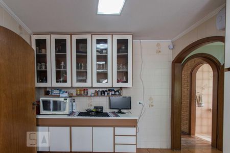 Casa à venda com 320m², 4 quartos e 4 vagas Casa à venda com 320m², 4 quartos e 4 vagasCozinha - Armários