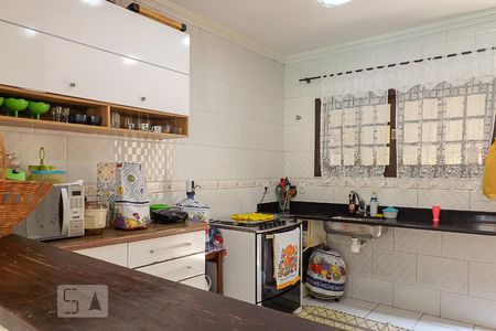 Casa de condomínio à venda com 180m², 4 quartos e 4 vagas Casa de condomínio à venda com 180m², 4 quartos e 4 vagasCozinha