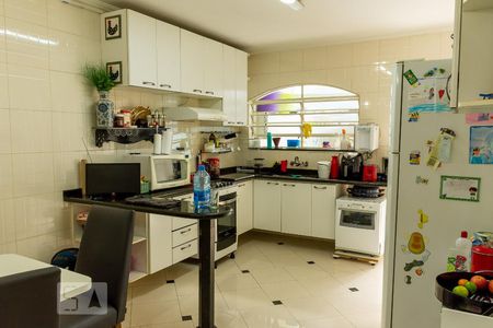 Casa à venda com 128m², 3 quartos e 2 vagas Casa à venda com 128m², 3 quartos e 2 vagasCozinha