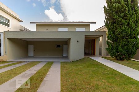 Casa de condomínio à venda com 297m², 4 quartos e 2 vagas Casa de condomínio à venda com 297m², 4 quartos e 2 vagasFachada