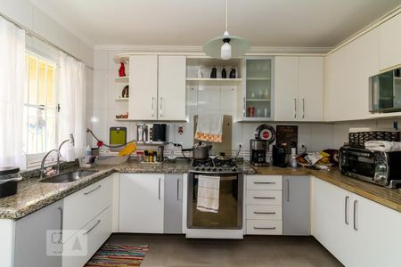 Casa à venda com 131m², 3 quartos e 2 vagas Casa à venda com 131m², 3 quartos e 2 vagasCozinha