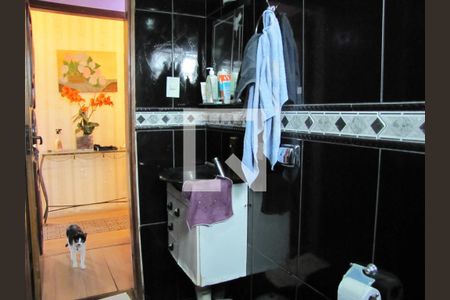 Casa à venda com 413m², 5 quartos e 6 vagasBanheiro Suíte 2