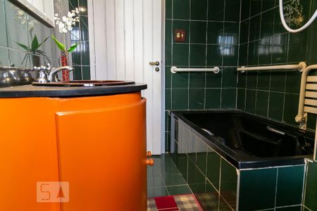 Casa à venda com 475m², 4 quartos e 5 vagasBanheiro suíte 3