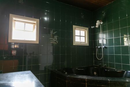 Casa à venda com 475m², 4 quartos e 5 vagasBanheiro suíte 1