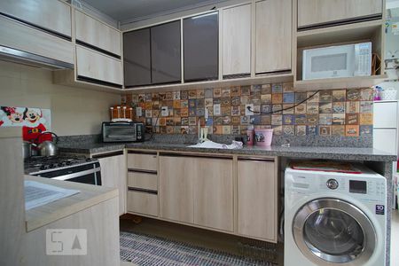 Casa de condomínio à venda com 68m², 2 quartos e 2 vagasCozinha