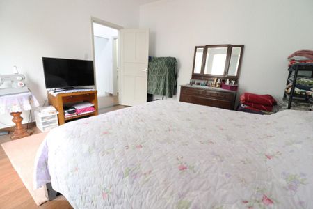 Casa à venda com 220m², 5 quartos e 2 vagasQuarto 1