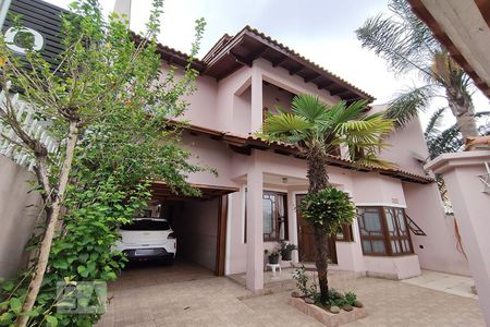 Casa à venda com 185m², 3 quartos e 2 vagas Casa à venda com 185m², 3 quartos e 2 vagasFachada