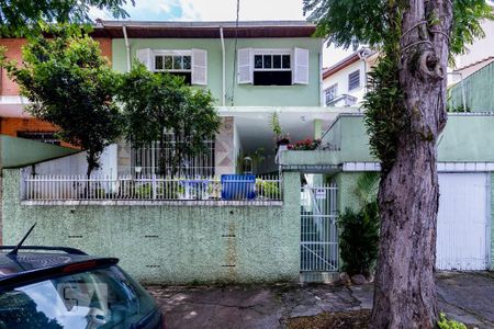 Casa à venda com 112m², 3 quartos e 1 vaga Casa à venda com 112m², 3 quartos e 1 vagaFachada