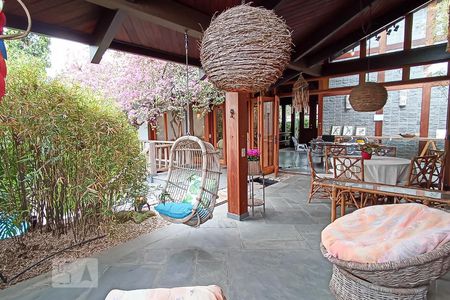 Casa de condomínio à venda com 650m², 4 quartos e 9 vagas Casa de condomínio à venda com 650m², 4 quartos e 9 vagasVaranda da sala