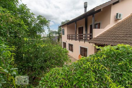 Casa de condomínio à venda com 304m², 4 quartos e 3 vagas Casa de condomínio à venda com 304m², 4 quartos e 3 vagasFachada fundos