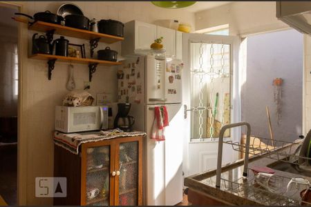 Casa à venda com 70m², 2 quartos e 2 vagas Casa à venda com 70m², 2 quartos e 2 vagasCozinha