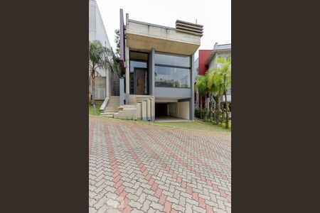 Casa de condomínio à venda com 480m², 4 quartos e 8 vagas Casa de condomínio à venda com 480m², 4 quartos e 8 vagasFachada
