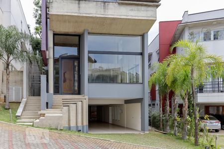 Casa de condomínio à venda com 480m², 4 quartos e 8 vagas Casa de condomínio à venda com 480m², 4 quartos e 8 vagasFachada