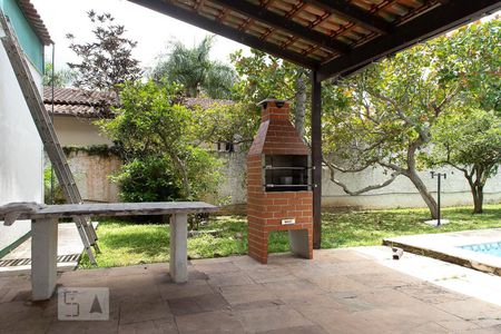 Casa à venda com 409m², 4 quartos e sem vaga Casa à venda com 409m², 4 quartos e sem vagaVaranda do quintal - Churrasqueira 1