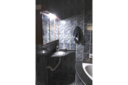 Casa à venda com 298m², 5 quartos e 4 vagasBanheiro 2- Suíte