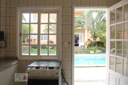 Casa de condomínio à venda com 387m², 6 quartos e 2 vagasÁrea Externa - Cozinha