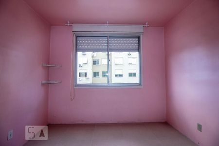 Quarto 1 de apartamento para alugar com 3 quartos, 90m² em Humaitá, Porto Alegre