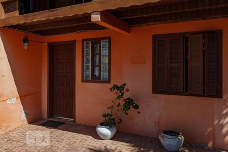 Casa à venda com 107m², 4 quartos e 1 vaga Casa à venda com 107m², 4 quartos e 1 vagaFachada