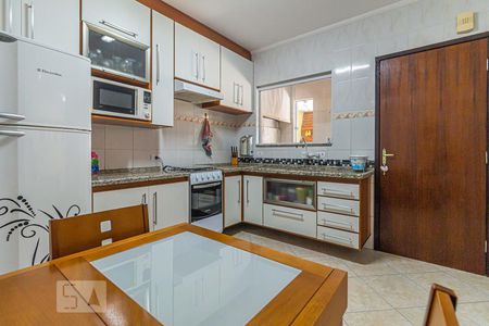 Casa à venda com 74m², 3 quartos e 2 vagas Casa à venda com 74m², 3 quartos e 2 vagasCozinha