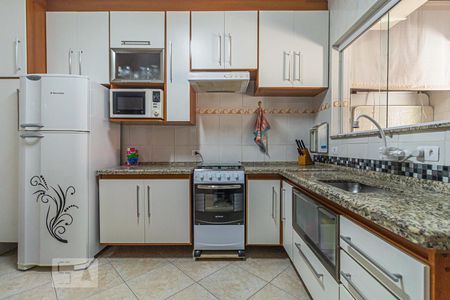 Casa à venda com 74m², 3 quartos e 2 vagas Casa à venda com 74m², 3 quartos e 2 vagasCozinha