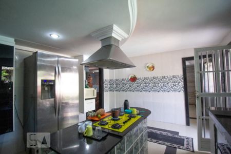 Casa de condomínio à venda com 370m², 4 quartos e 3 vagas Casa de condomínio à venda com 370m², 4 quartos e 3 vagasCozinha