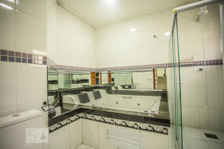 Casa à venda com 310m², 4 quartos e 4 vagasBanheiro Suíte