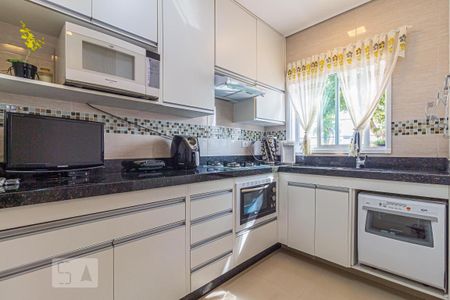 Casa à venda com 91m², 2 quartos e 2 vagas Casa à venda com 91m², 2 quartos e 2 vagasCozinha